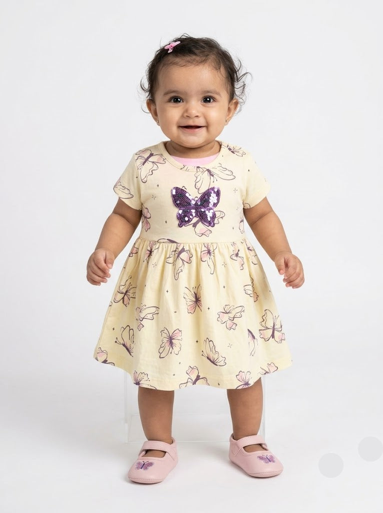 Baby's frock - yellows