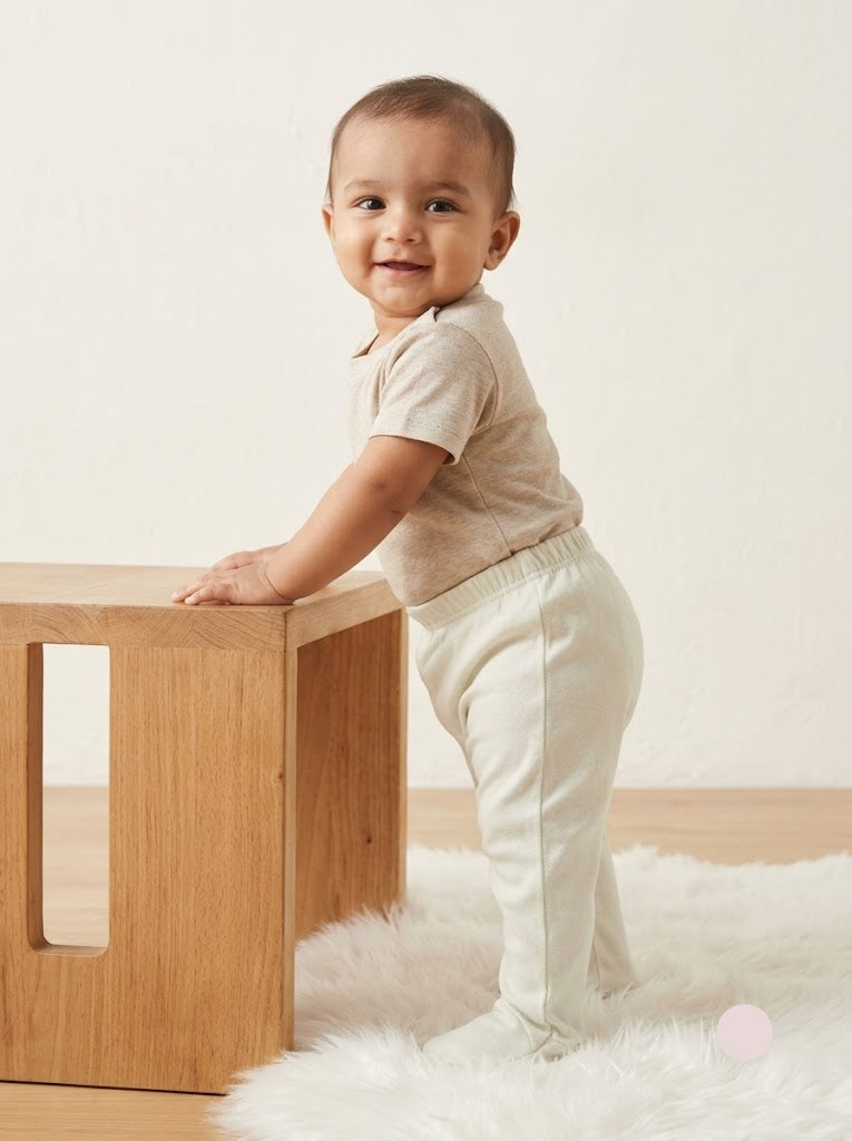 Baby's pants with attached shoe - beige