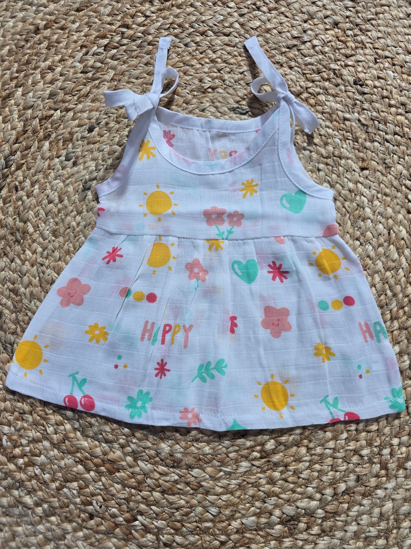 Baby's muslin frock knot -Happy print