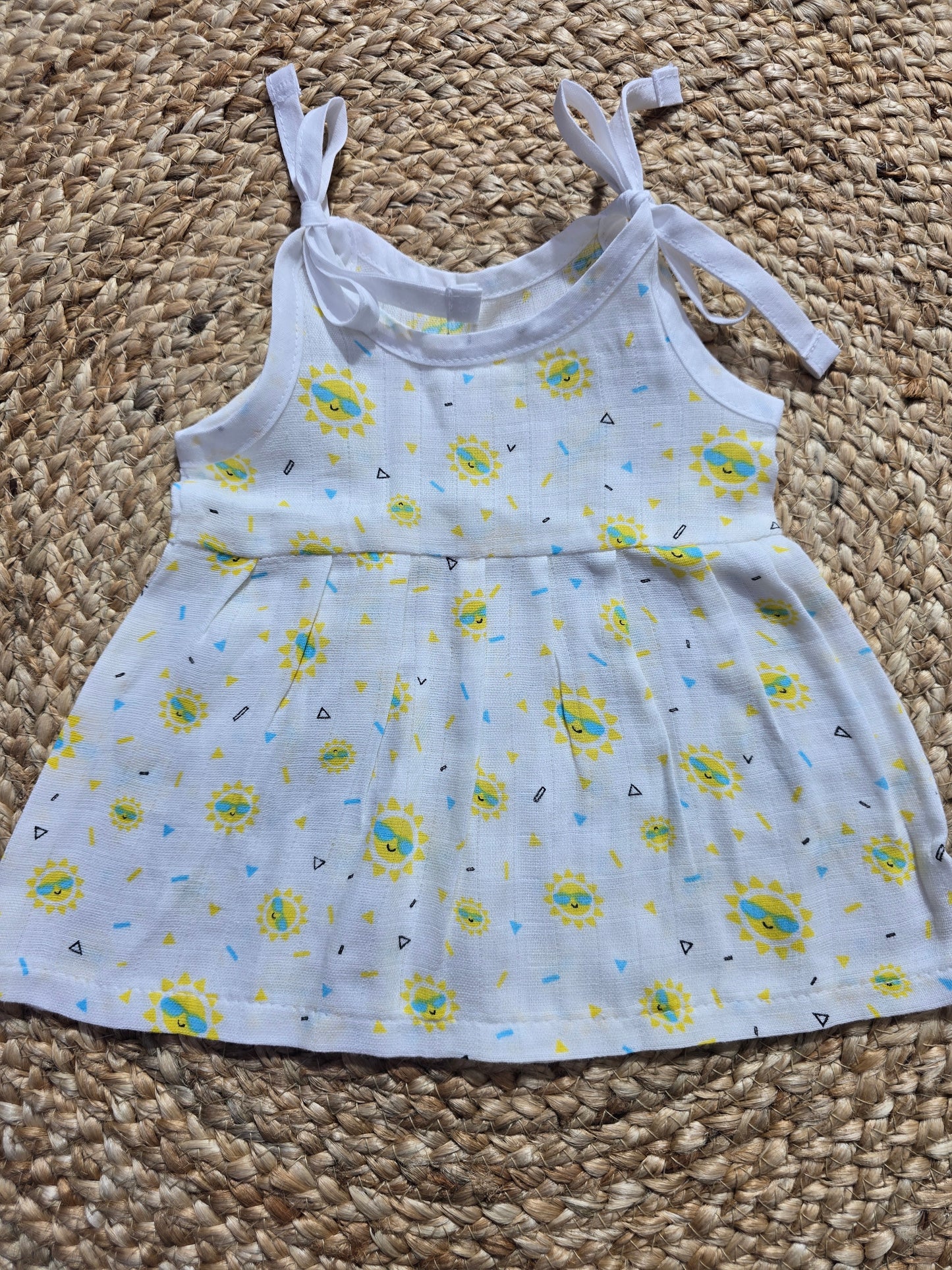 Baby's muslin frock knot - Sun
