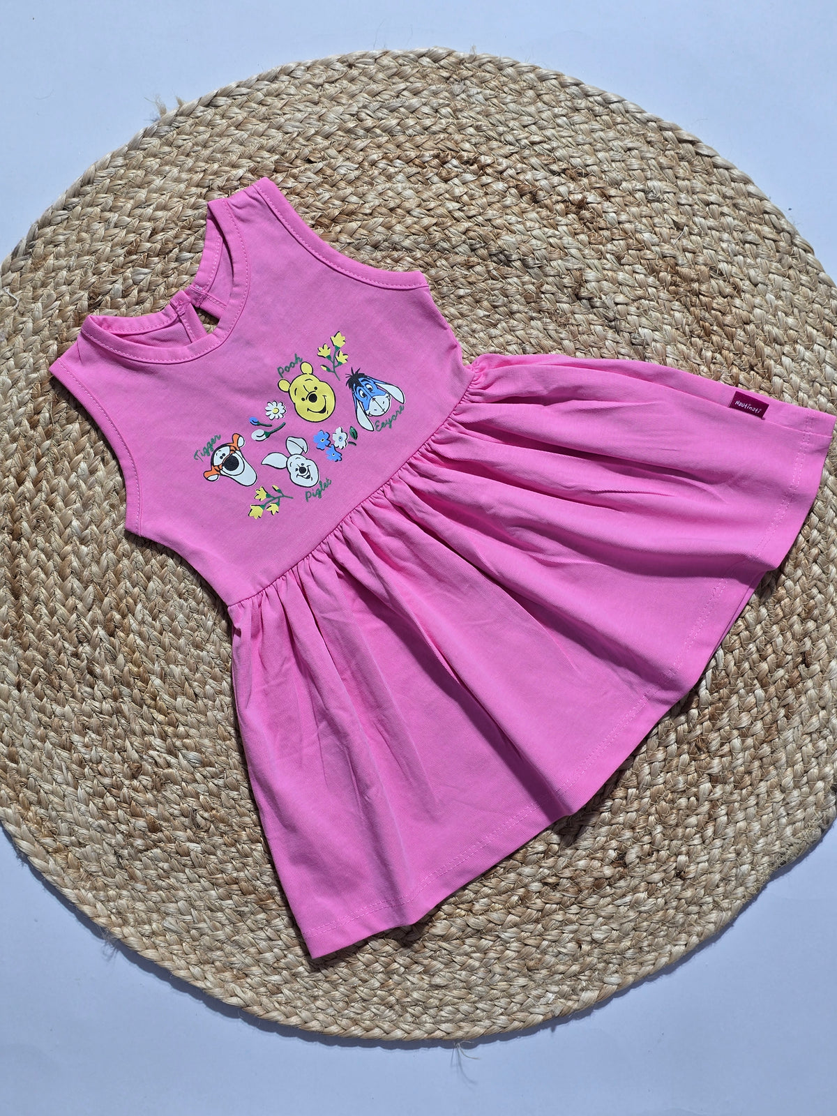 Baby's frock - pink pooh