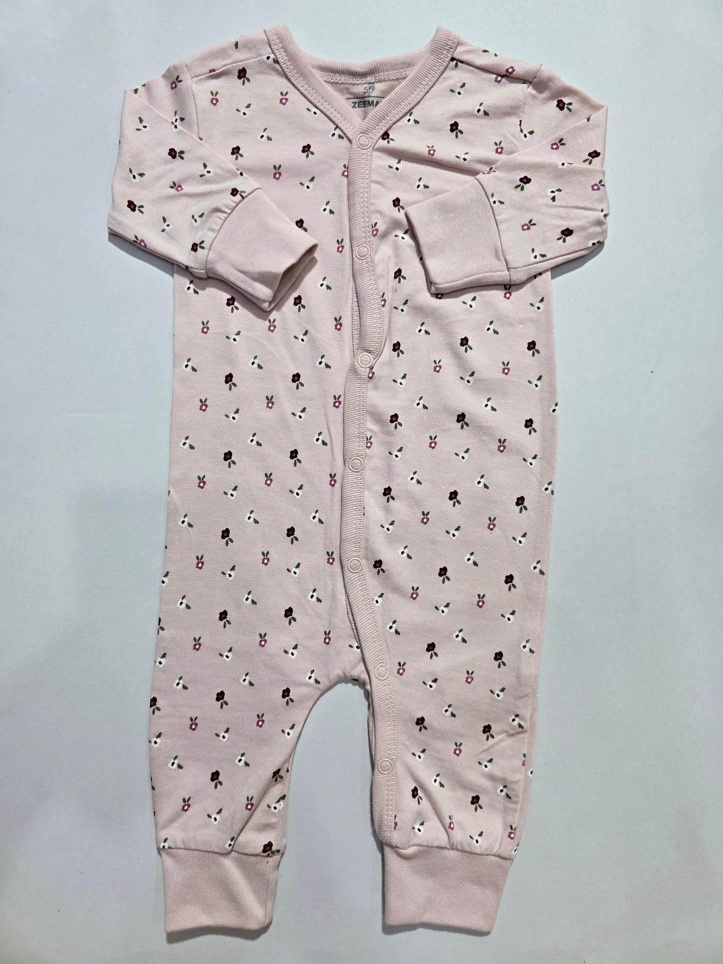 Baby's jumpsuit/sleepsuit - pink flowers