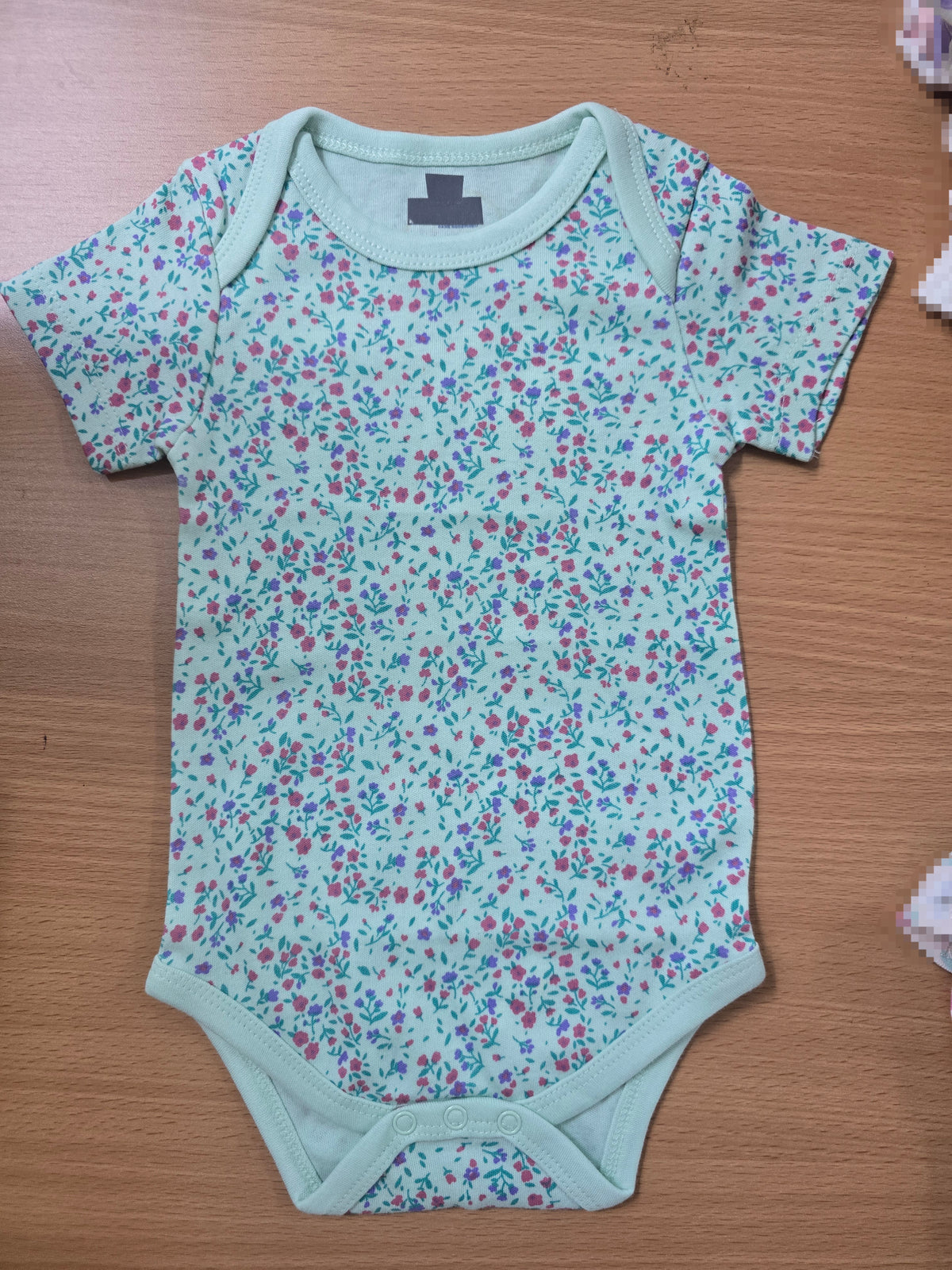 Baby's rompers - blossom plant