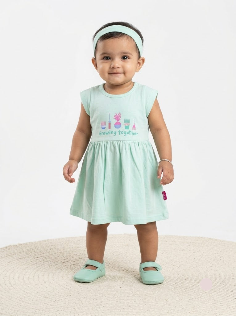 Baby's frock - mint green
