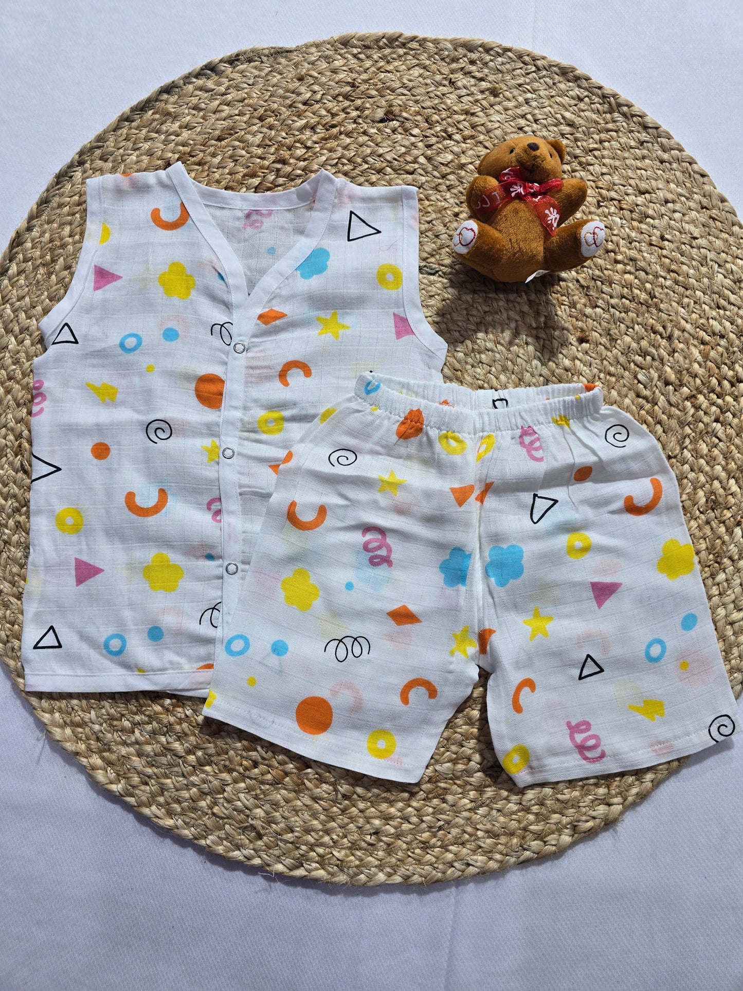 Baby's muslin Co-ord set - Shapes orange