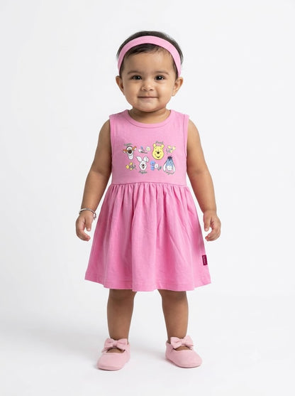 Baby's frock - pink pooh