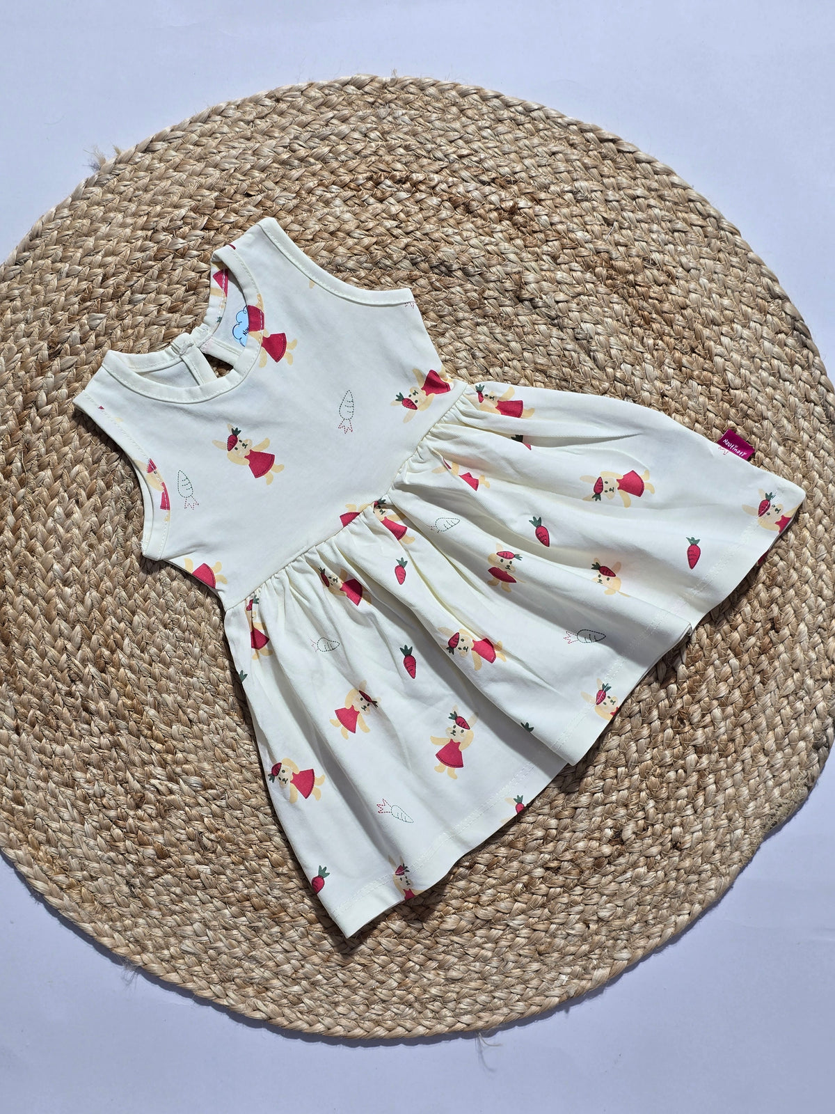 Baby's frock - carrot
