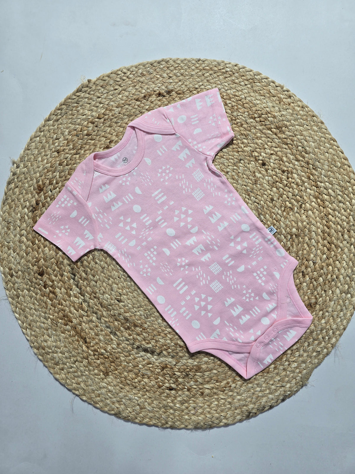Baby's rompers - pink shapes