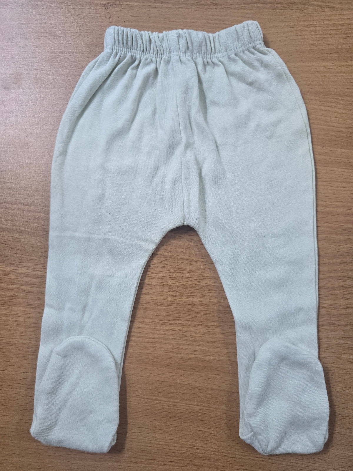 Baby's pants with attached shoe - beige