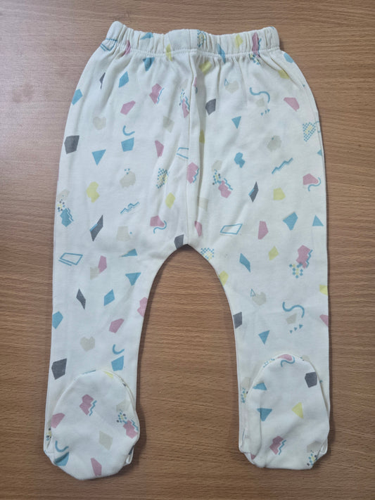 Baby's pants with attached shoe - beige shapes
