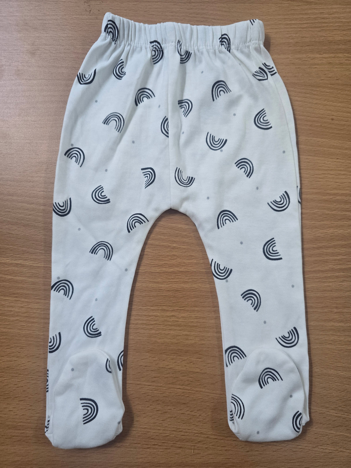 Baby's pants with attached shoe - black rainbow