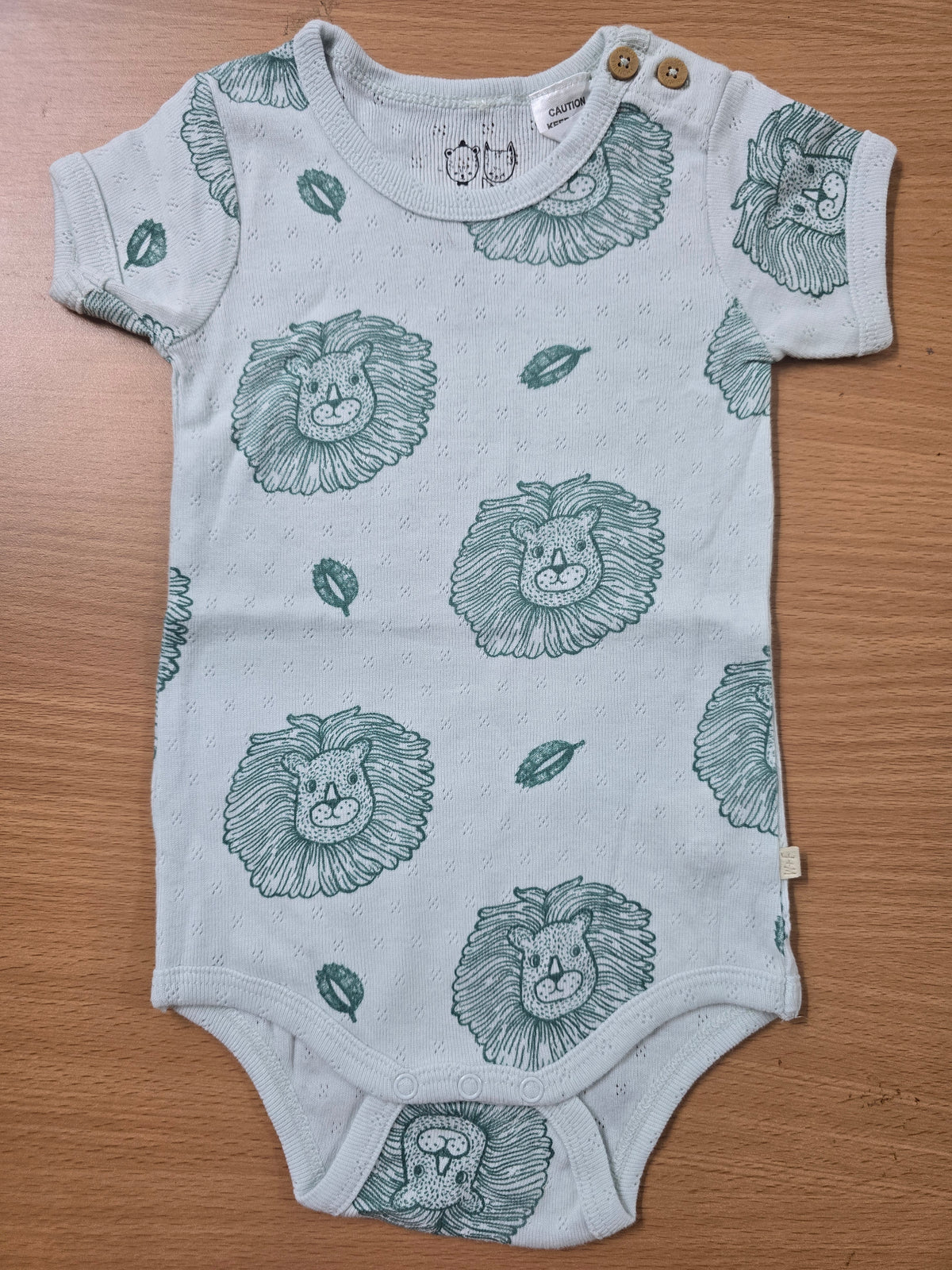 Baby's rompers - lion face